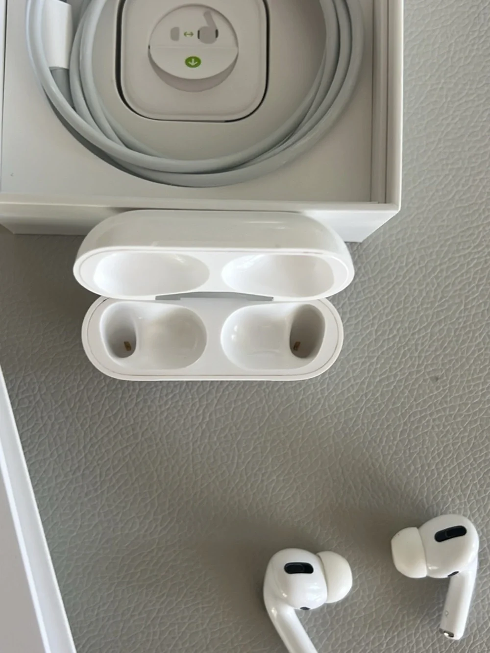 Apple AirPods Pro with charging cord